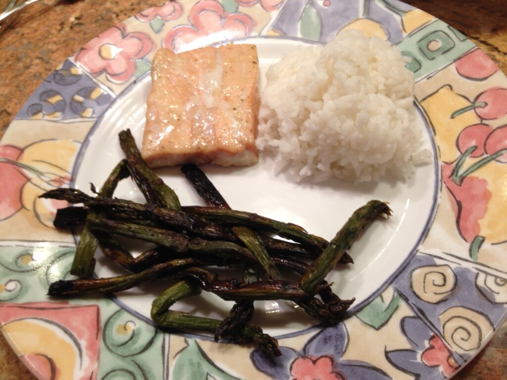 Grilled salmon, white rice, and some baked asparagus.