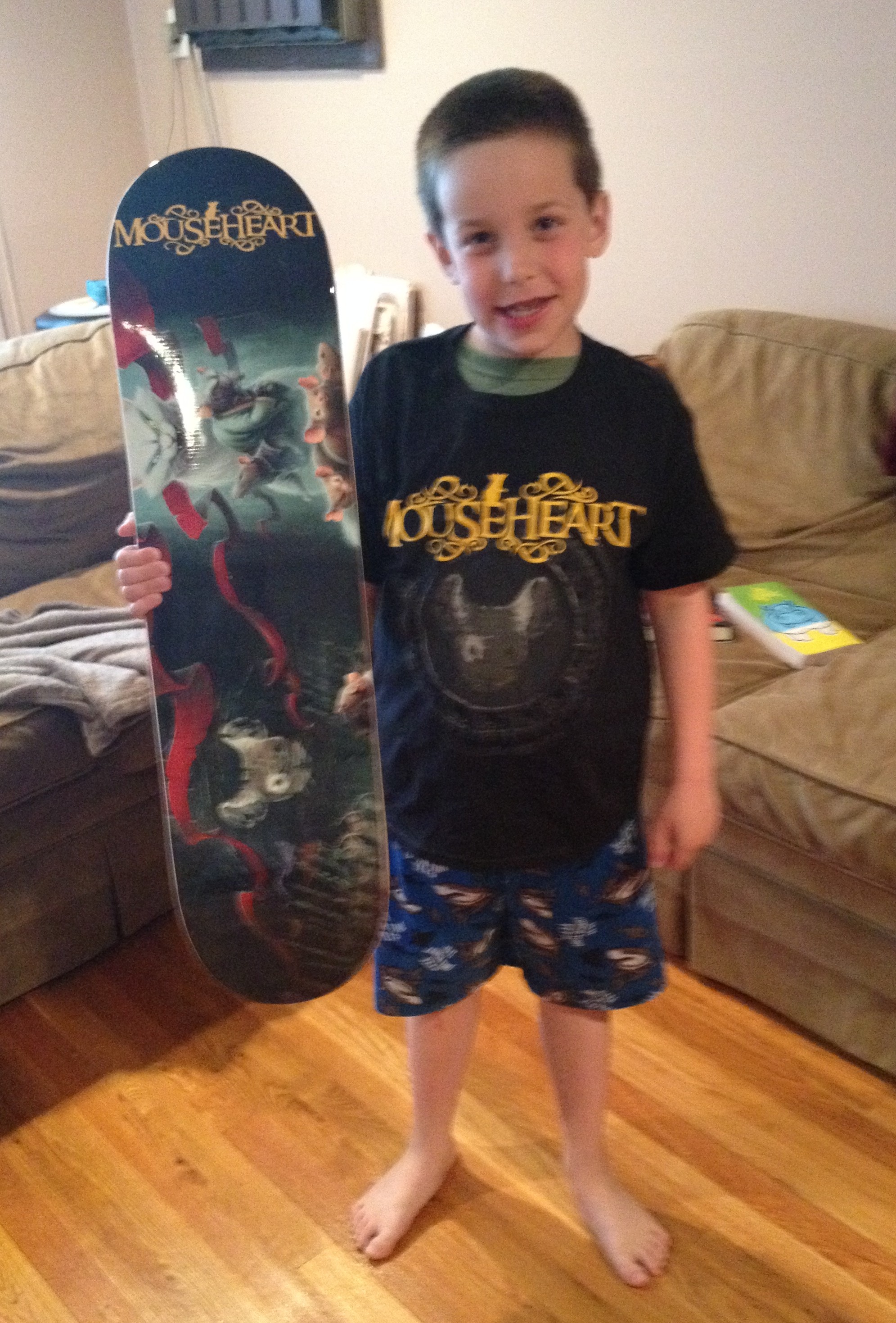 Ryan shows off his Mouseheart T-shirt and Skate Deck