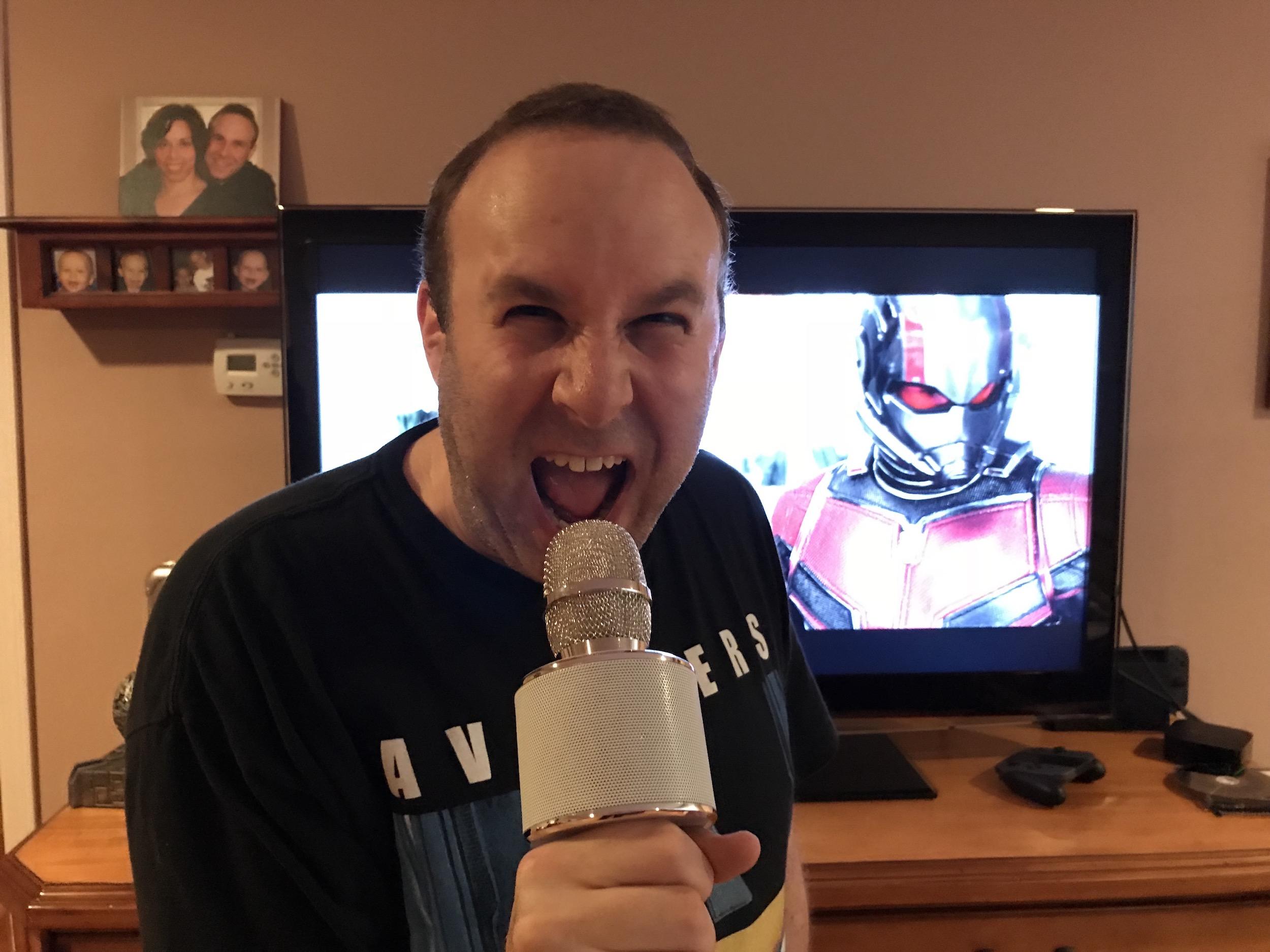  I loved Ant-Man. Such a hugely emotional story packed into a teeny tiny character. So when Ant-Man and the Wasp came out, I was blown away at twice the action, twice the teeny tiny superheroes and twice the shockers!  If you haven't seen Ant-Man and the Wasp yet... shut the door! No, really. Go shut the door then sit on your couch and start streaming it because that bad boy is available now on digital download! And on October 16, you can take Ant-Man and the Wasp home as a super spiffy Blu-ray.  Without giving too much away, the film sees our hero Scott Lang stuck at home. Following the amazingly awesome events of Captain America: Civil War, our bugtastic hero found himself arrested. Thankfully, Scott Lang (Ant-Man) doesn't have to continue doing time on The Raft (a floating prison). Instead, he's stuck serving house arrest. On the plus side, he gets to spend some quality and creative time with his daughter Cassie.  Those folks over at Marvel thought it'd be fun for some of us bloggers to take on the role of Scott Lang and spend a Fun-At-Home Day In with our kids. Here's what they suggested: To help out, I was sent this crazy mystery box! What, pray tell, was inside it you may ask? Go ahead. Ask.  Yeeehah that's a lot of fun, cool Ant-Man and the Wasp loot! Specifically, we're talking about: Ant-Man and the Wasp Blu-ray Karaoke microphone (USB!) Deck of playing cards and a book of magic tricks Origami set Indoor bowling set Mini finger drum kit Indoor basketball hoop and basketball Bubble Bath set of a bath bomb and an Ant-Man and the Wasp towel #ANTMANANDTHEWASPBLURAY.