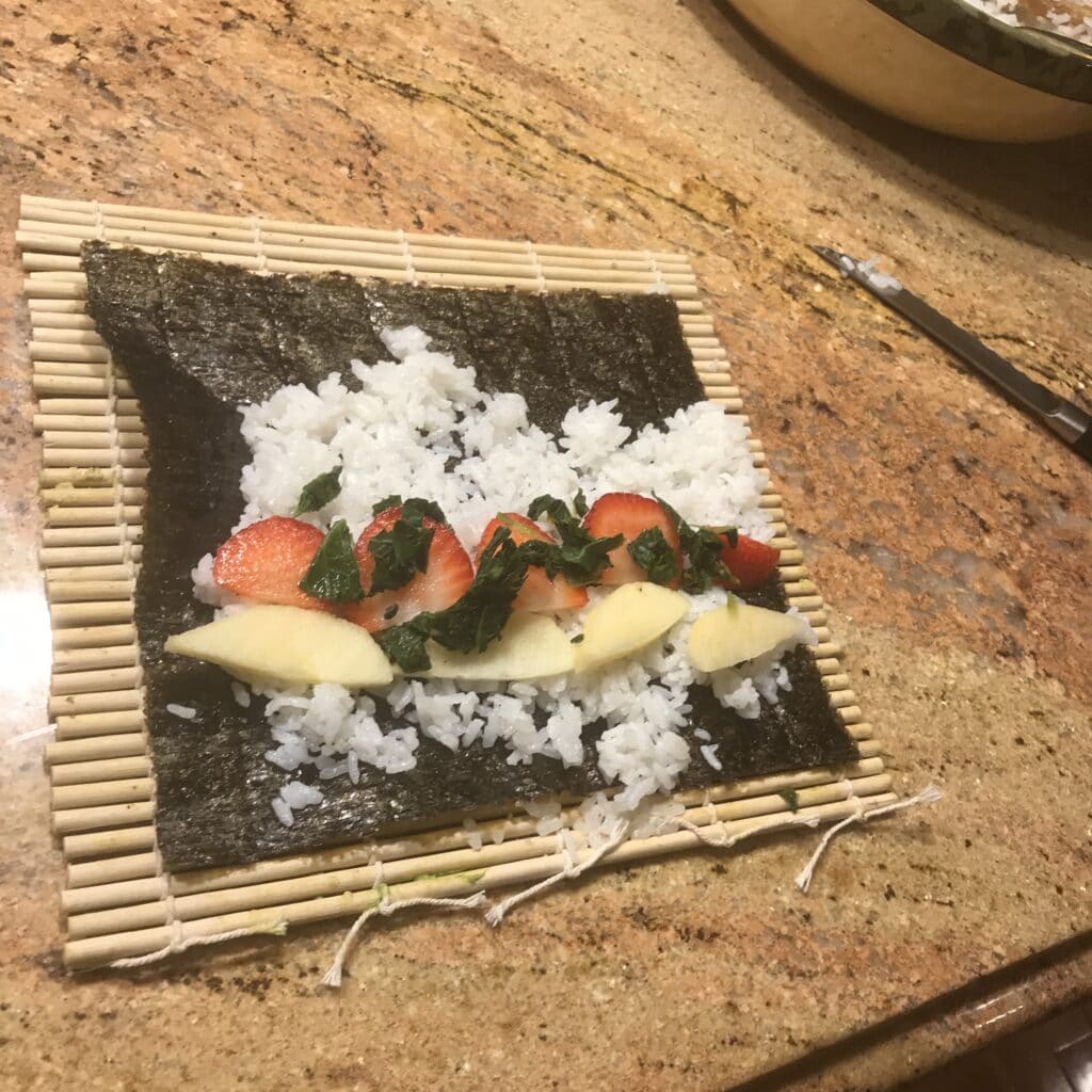 Rolling homemade sushi
