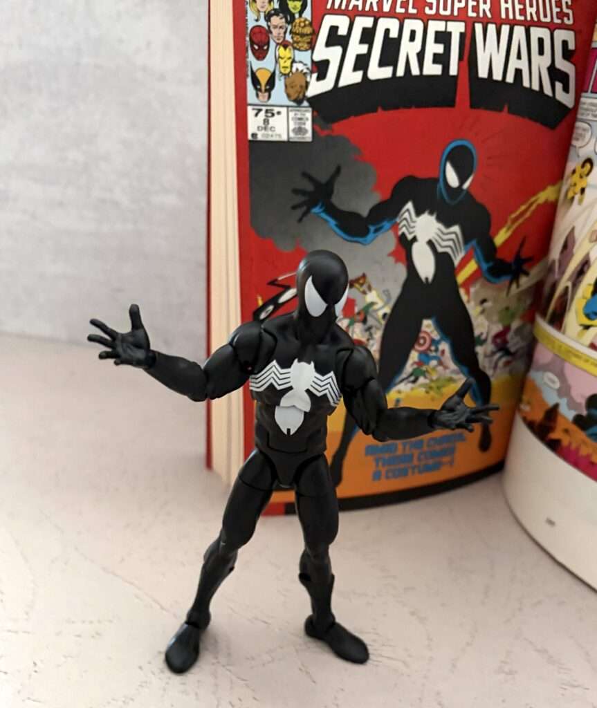 Black costume Spider-Man action figure with Secret Wars #8 cover