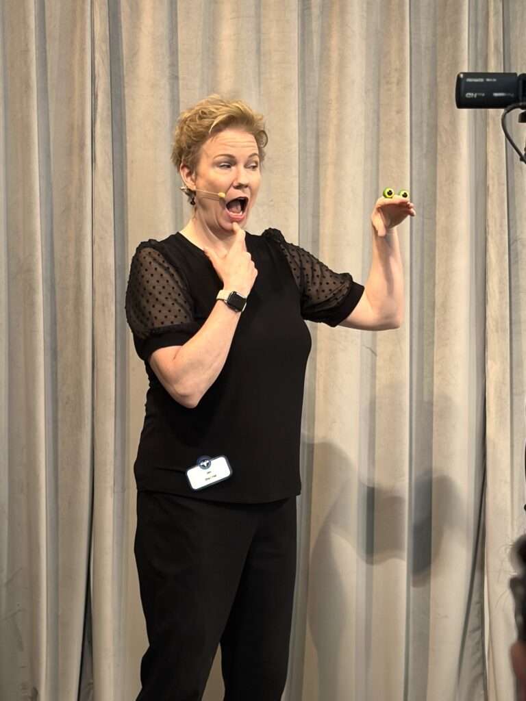 Jen Barnhart teaching hand puppet lessons