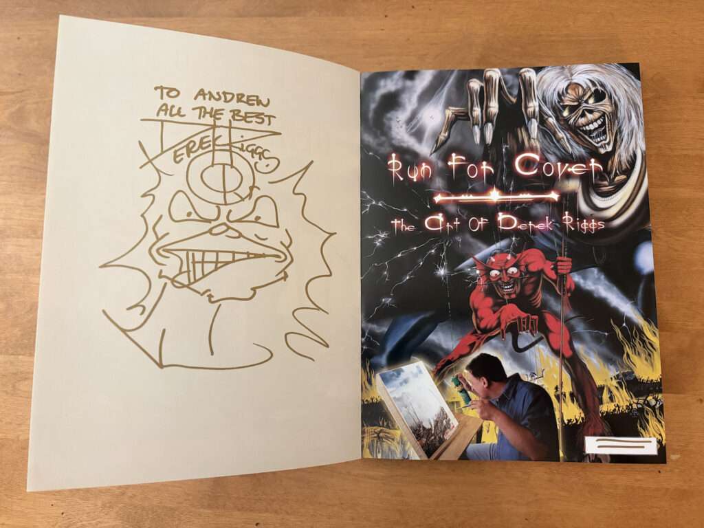 Derek Riggs autographed version of his art book Run for Covers